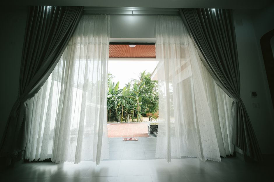 Beautiful glass french doors leading to a patio